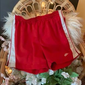 Red Nike shorts
